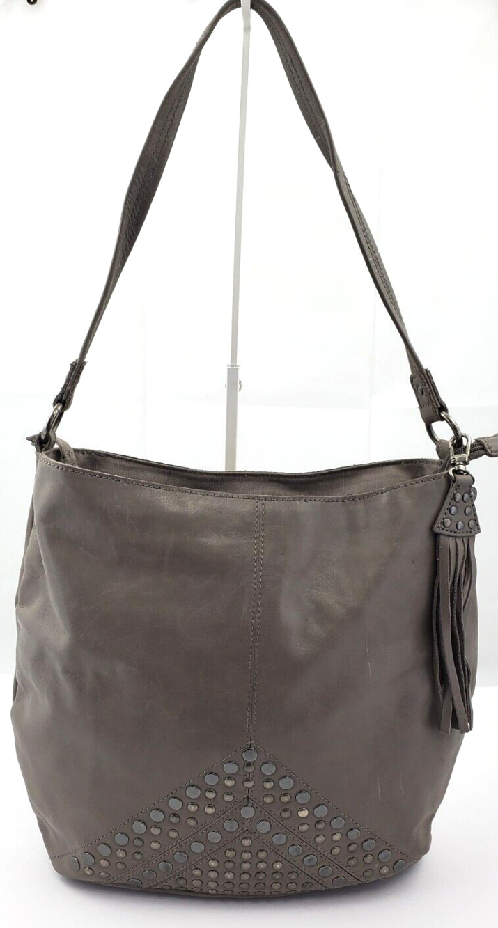 The Sak Indio Used Grey Glazed Leather Studded Hobo Shoulder Bag w Fringe Tassel